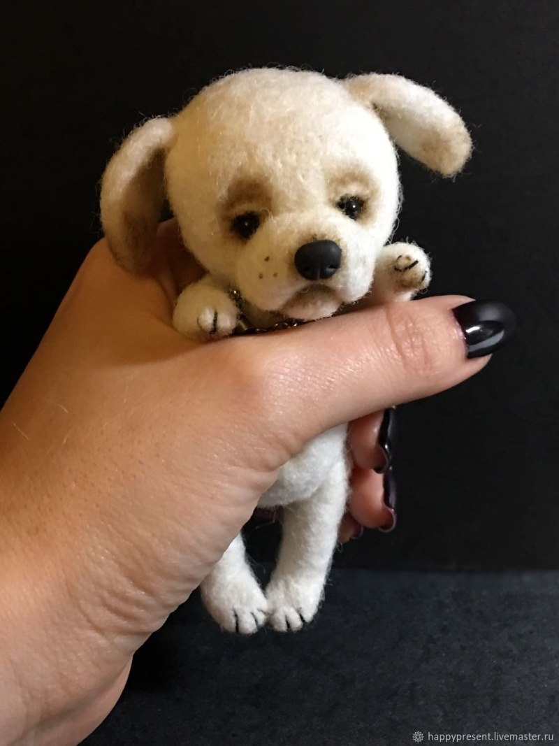 Щенок похожий на игрушку